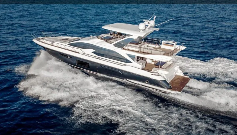 Mancusa Yacht Photos Pics 2016 Azimut Fly 72 yacht cruising on open sea, showcasing sleek design and luxury features.