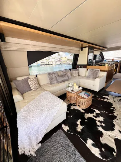 Mancusa Yacht Photos Pics Luxurious interior of 2016 Azimut Fly 72 yacht with elegant seating and decor.