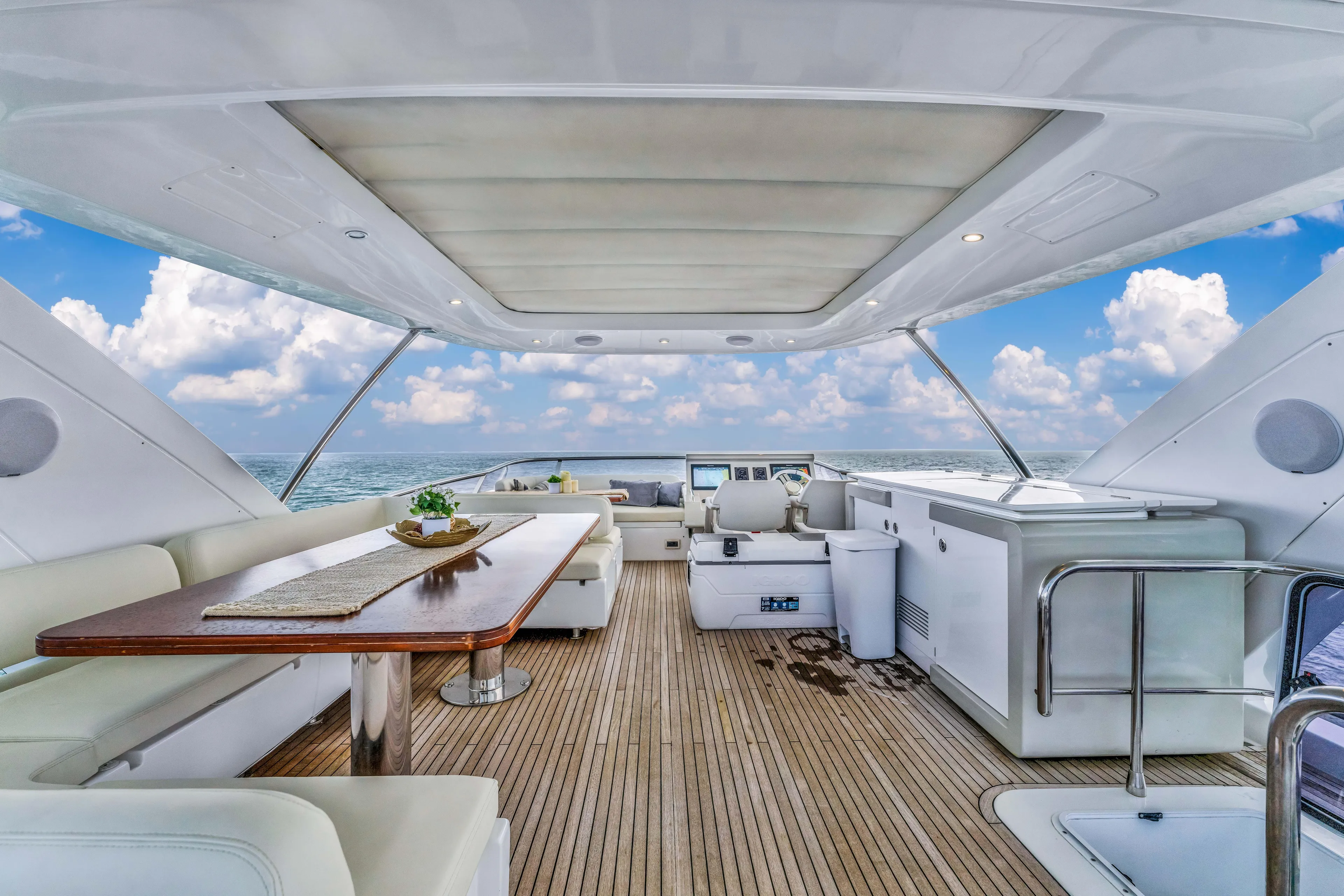 Mancusa Yacht Photos Pics Luxurious 2016 Azimut Fly 72 yacht interior with elegant seating and ocean view.