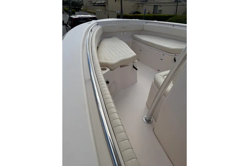  Yacht Photos Pics 2007 Grady-White Bimini 306 boat interior with cushioned seating and stainless steel railings.