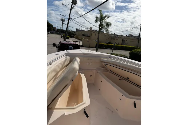  Yacht Photos Pics 2007 Grady-White Bimini 306 boat interior with open storage compartments.