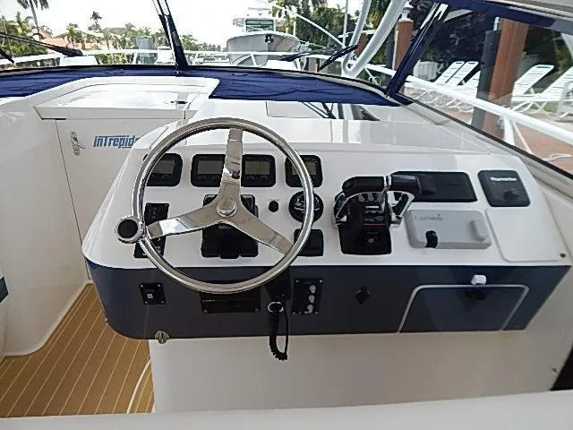 Intrepidation Yacht Photos Pics Helm of 2009 Intrepid 430 Sport Yacht with steering wheel and control panel.