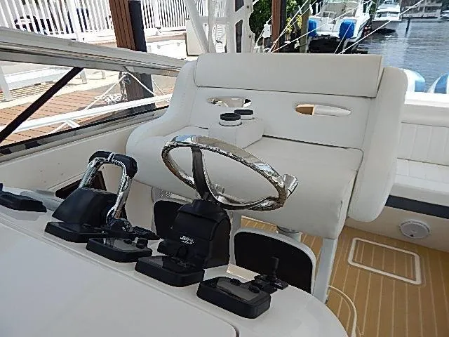 Intrepidation Yacht Photos Pics 2009 Intrepid 430 Sport Yacht helm with steering wheel and controls.