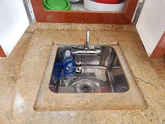 Intrepidation Yacht Photos Pics Marble countertop with stainless steel sink on 2009 Intrepid 430 Sport Yacht.