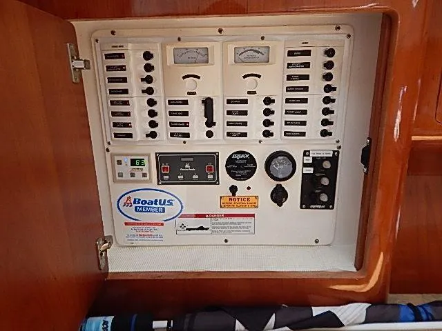 Intrepidation Yacht Photos Pics Electrical control panel inside a 2009 Intrepid 430 Sport Yacht, featuring various switches and gauges.