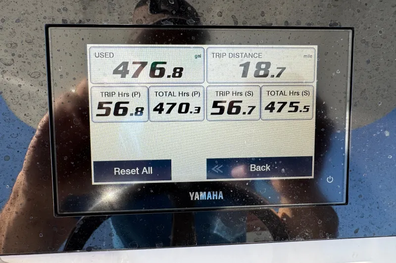  Yacht Photos Pics Display screen showing fuel usage and trip data for 2015 Regulator 28 Forward Seating boat.