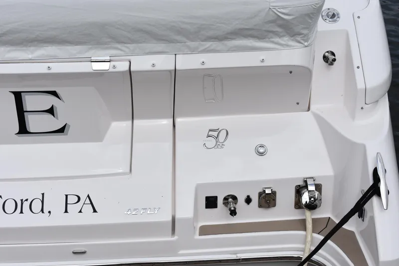 Me Yacht Photos Pics Regal 42 Fly 2021 yacht stern with port details and logo.