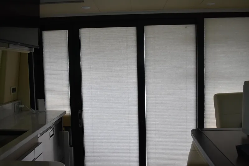 Me Yacht Photos Pics Interior view of 2021 Regal 42 Fly yacht with closed blinds.