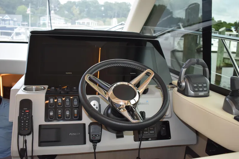 Me Yacht Photos Pics Helm of 2021 Regal 42 Fly yacht with modern controls and steering wheel.