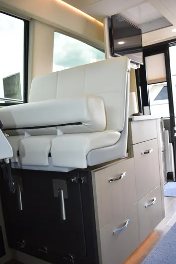 Me Yacht Photos Pics 2021 Regal 42 Fly yacht interior with white seating and modern cabinetry.