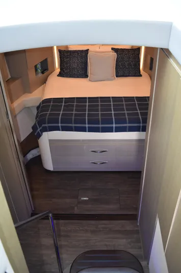Me Yacht Photos Pics Luxurious cabin interior of 2021 Regal 42 Fly yacht with cozy bedding.