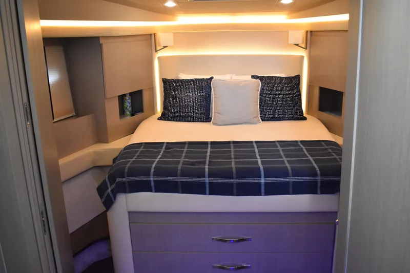 Me Yacht Photos Pics Luxurious bedroom interior of 2021 Regal 42 Fly yacht with modern lighting and decor.
