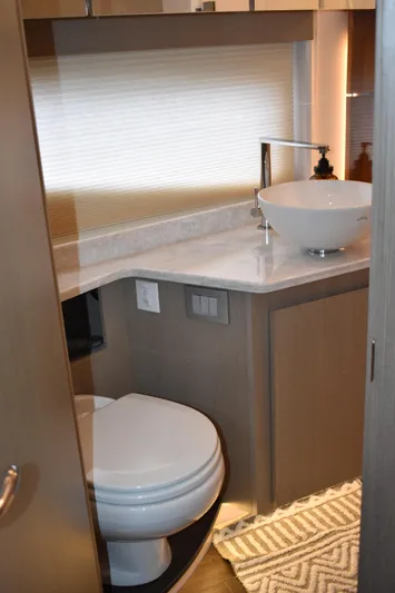 Me Yacht Photos Pics Modern bathroom in 2021 Regal 42 Fly yacht with sleek fixtures and stylish design.