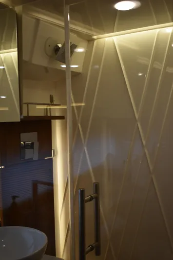 Me Yacht Photos Pics Luxurious bathroom interior of 2021 Regal 42 Fly yacht with modern lighting.