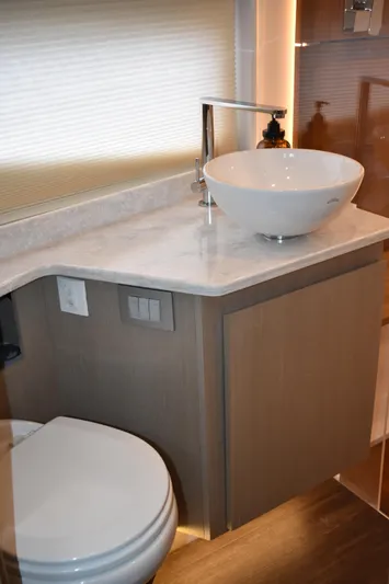 Me Yacht Photos Pics Modern bathroom in 2021 Regal 42 Fly yacht with vessel sink and sleek design.