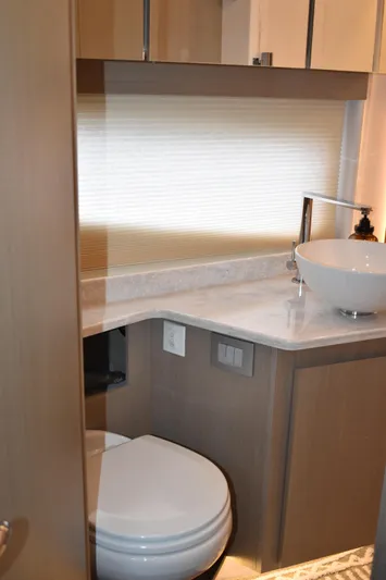 Me Yacht Photos Pics 2021 Regal 42 Fly yacht bathroom with modern sink and toilet.