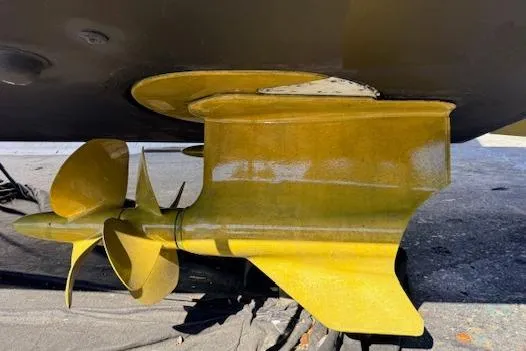 Me Yacht Photos Pics Propeller and rudder of 2021 Regal 42 Fly yacht, showcasing marine engineering.