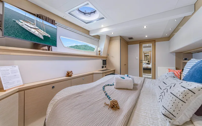 Wonderlust Yacht Photos Pics Luxurious cabin interior of 2016 Fountaine Pajot 72 yacht with modern decor and natural light.