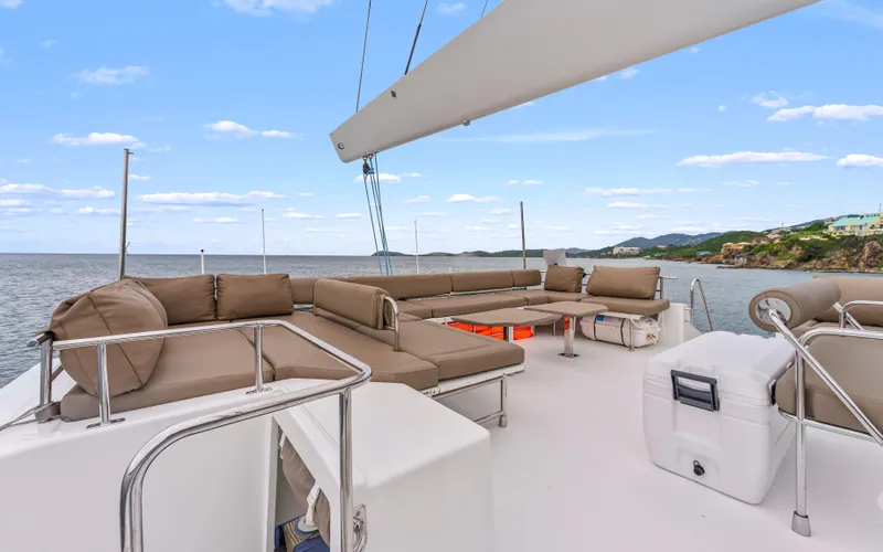 Wonderlust Yacht Photos Pics Luxurious 2016 Fountaine Pajot 72 yacht deck with comfortable seating and ocean view.
