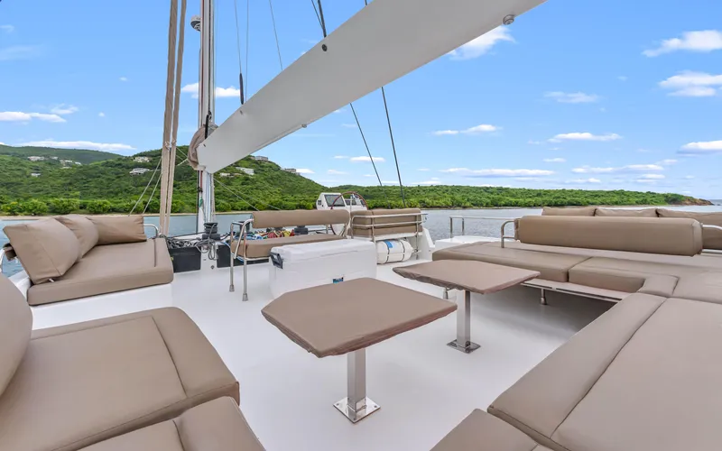Wonderlust Yacht Photos Pics Luxurious 2016 Fountaine Pajot 72 yacht deck with comfortable seating and scenic views.