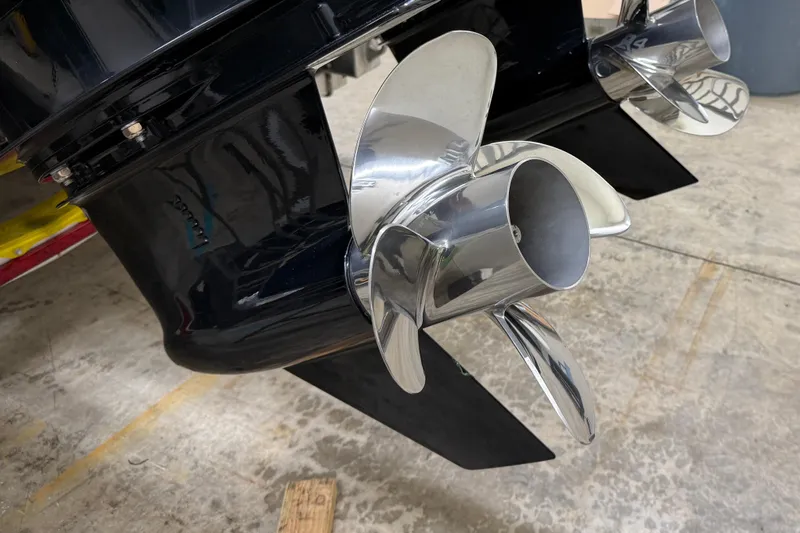 Dfndr1 Yacht Photos Pics Close-up of XO Boats DFNDR 9 2021 dual propellers on a concrete floor.