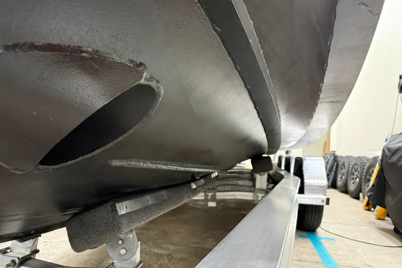 Dfndr1 Yacht Photos Pics 2021 XO Boats DFNDR 9 hull on trailer, showcasing sleek design and craftsmanship.