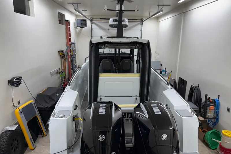 Dfndr1 Yacht Photos Pics 2021 XO Boats DFNDR 9 in garage with dual outboard engines.