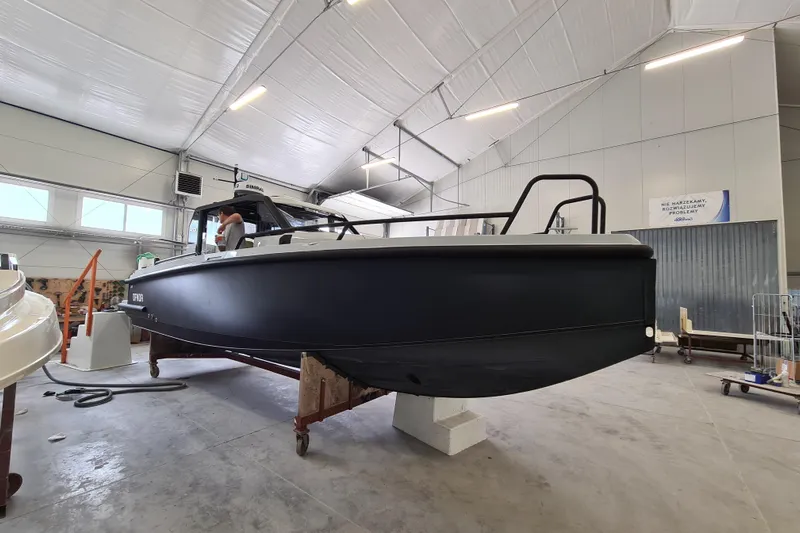 Dfndr1 Yacht Photos Pics 2021 XO Boats DFNDR9 with Trailer in a spacious indoor facility.