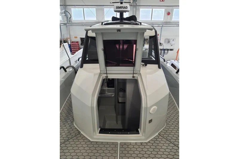 Dfndr1 Yacht Photos Pics 2021 XO Boats DFNDR9 with Trailer, interior view in a showroom setting.