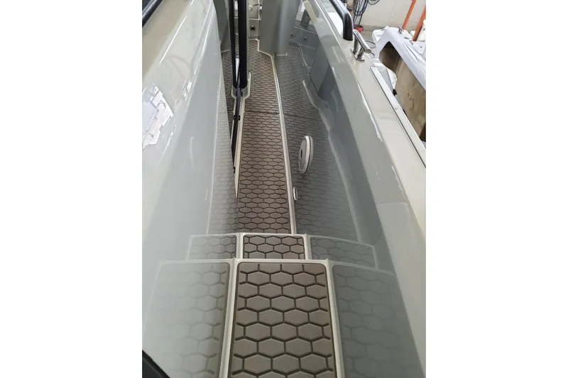 Dfndr1 Yacht Photos Pics 2021 XO Boats DFNDR9 interior with hexagonal flooring design.