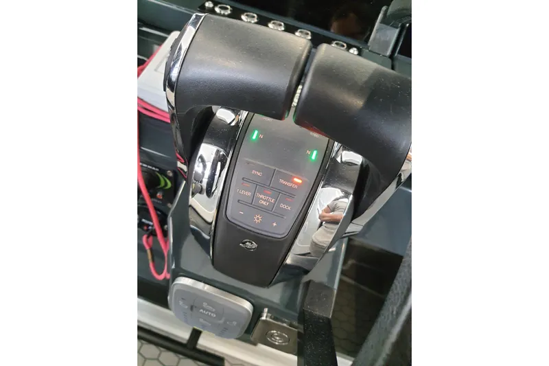 Dfndr1 Yacht Photos Pics Close-up of 2021 XO Boats DFNDR9 throttle controls with illuminated indicators.