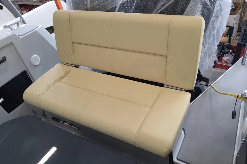Dfndr1 Yacht Photos Pics Beige seat on 2021 XO Boats DFNDR9 with Trailer, showcasing interior design.
