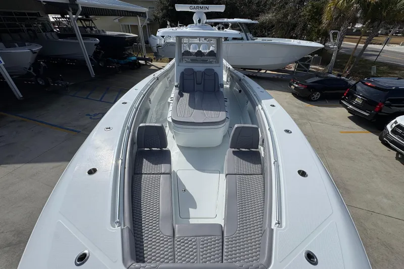  Yacht Photos Pics 2026 Invincible 43 Open Fisherman boat with sleek design and spacious seating.