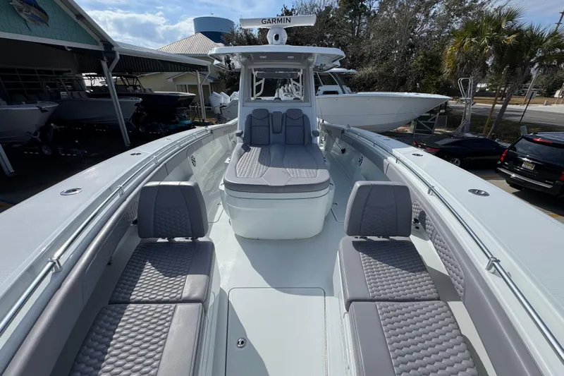  Yacht Photos Pics 2026 Invincible 43 Open Fisherman boat with sleek seating and modern design.
