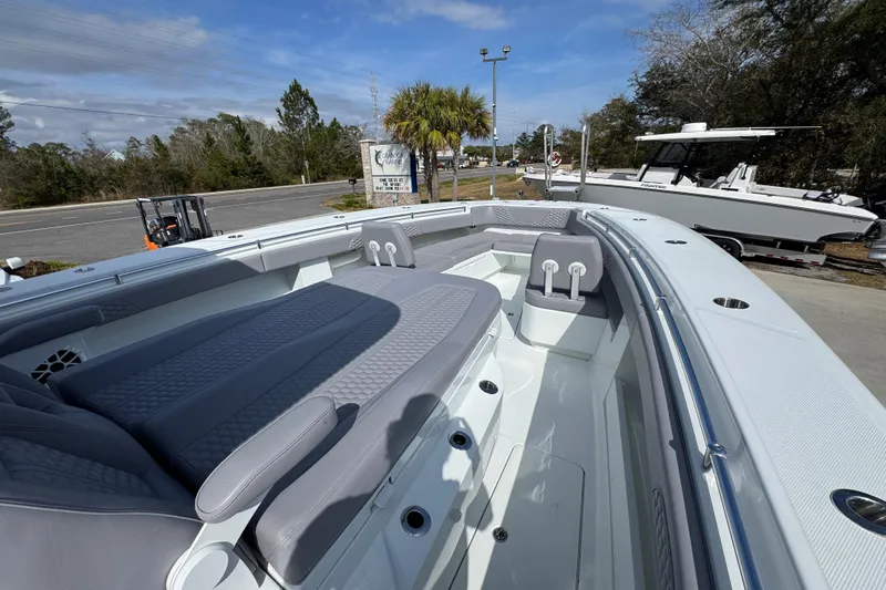  Yacht Photos Pics 2026 Invincible 43 Open Fisherman boat with spacious seating and sleek design.