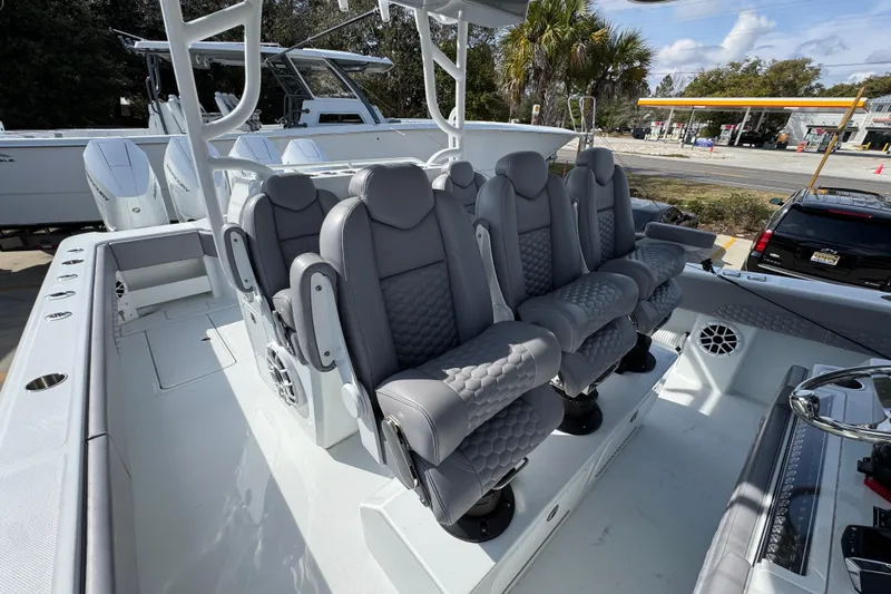  Yacht Photos Pics 2026 Invincible 43 Open Fisherman boat with luxurious seating and modern design.