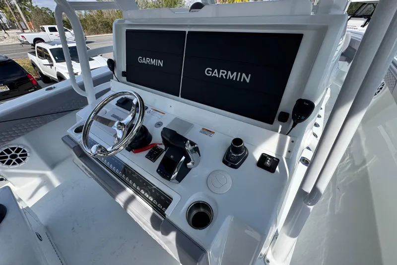  Yacht Photos Pics 2026 Invincible 43 Open Fisherman helm with dual Garmin displays and modern controls.