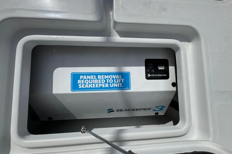  Yacht Photos Pics Seakeeper 3 unit in 2026 Invincible 43 Open Fisherman boat compartment.