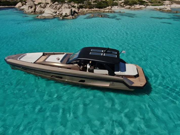 Katana Yacht Photos Pics Apex Yachts Wasabi 60, 2023 model, cruising in clear turquoise waters.