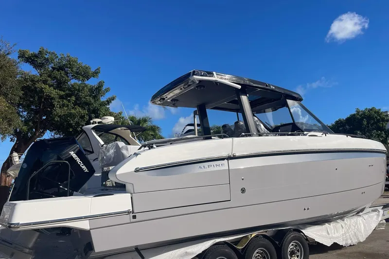  Yacht Photos Pics 2026 Beneteau Gran Turismo 35 boat on trailer, under clear blue sky.