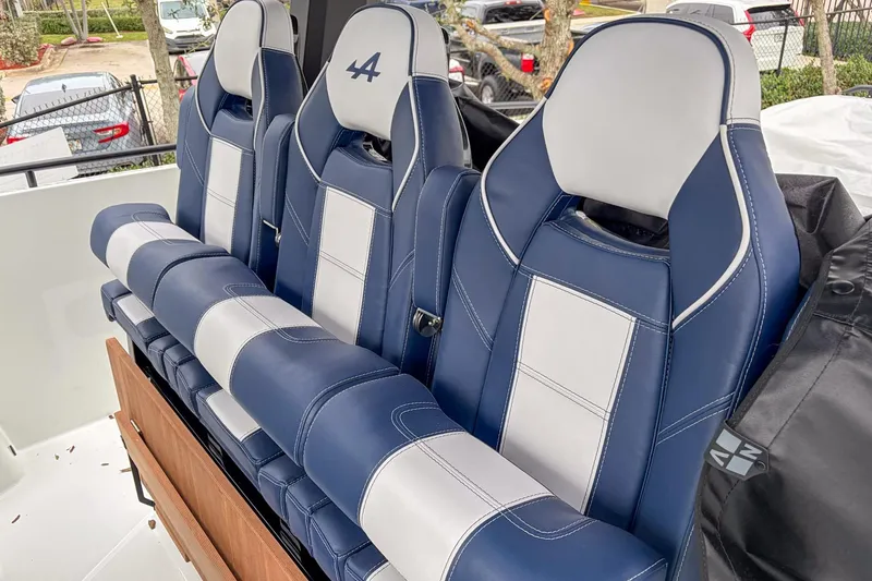  Yacht Photos Pics Luxury seating on 2026 Beneteau Gran Turismo 35, featuring blue and white upholstery.