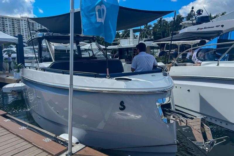  Yacht Photos Pics 2026 Beneteau Gran Turismo 35 yacht docked at marina, showcasing sleek design.