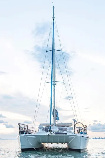 Stella Maris Yacht Photos Pics Front view of a 2016 Custom 50 Len Jenkins catamaran on calm water.