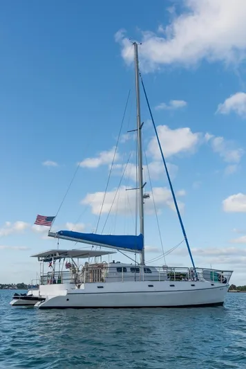 Stella Maris Yacht Photos Pics Custom 50 Len Jenkins sailboat, 2016 model, on calm water under a clear blue sky.