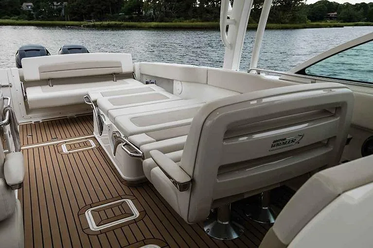  Yacht Photos Pics Manufacturer Provided Image: 2023 Boston Whaler 320 Vantage boat interior with seating and wooden deck.