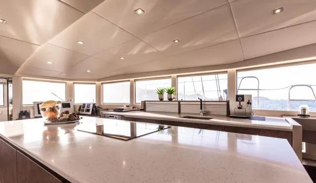  Yacht Photos Pics Luxurious interior of 2024 Eyecat 55 Autumn yacht with modern kitchen and panoramic windows.