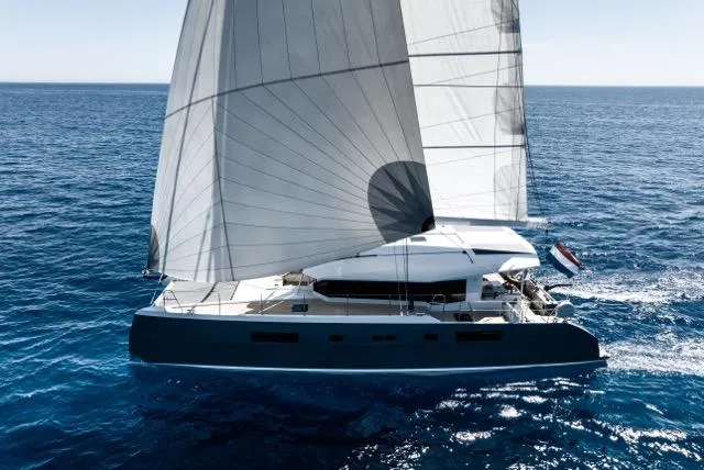  Yacht Photos Pics Sailing yacht Eyecat 55 Autumn 2024 gliding on open sea with full sails.