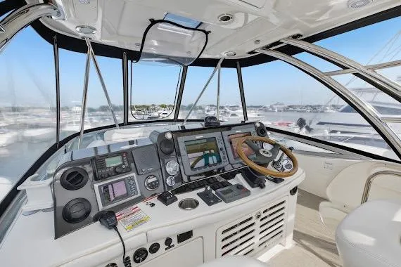  Yacht Photos Pics 2008 Sea Ray 47 Sedan Bridge helm with advanced navigation systems and panoramic marina view.