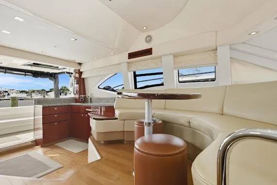  Yacht Photos Pics Luxurious interior of 2008 Sea Ray 47 Sedan Bridge yacht with modern furnishings.