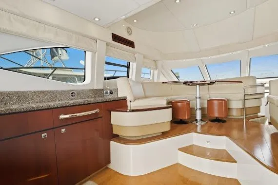  Yacht Photos Pics Luxurious interior of 2008 Sea Ray 47 Sedan Bridge yacht with elegant seating and modern design.